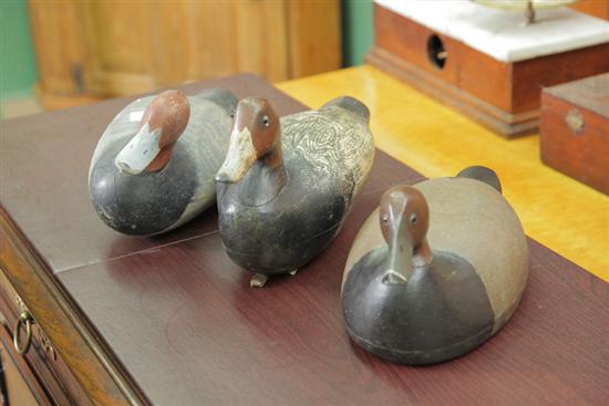 Appraisal: THREE DUCK DECOYS All painted Redhead Drakes A Madison Mitchell