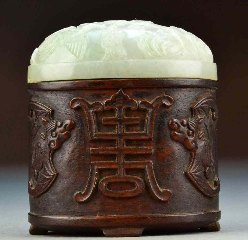 Appraisal: A Fine Chinese Huanghuali Wood Jade BoxThe box finely carved