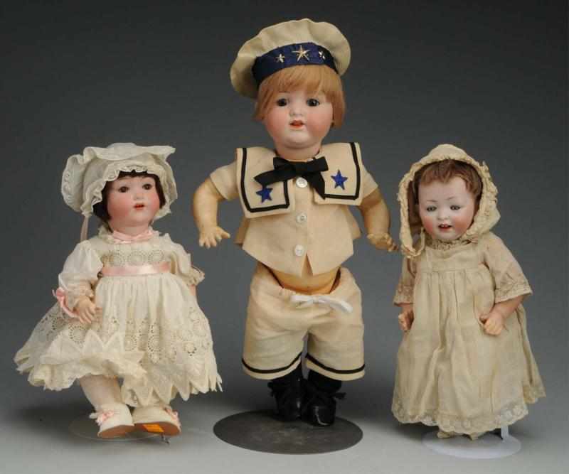 Appraisal: Lot of German Bisque Character Dolls Description A M sleeping