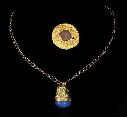 Appraisal: Persian Lapis and Gold Pendant on a Chain together with