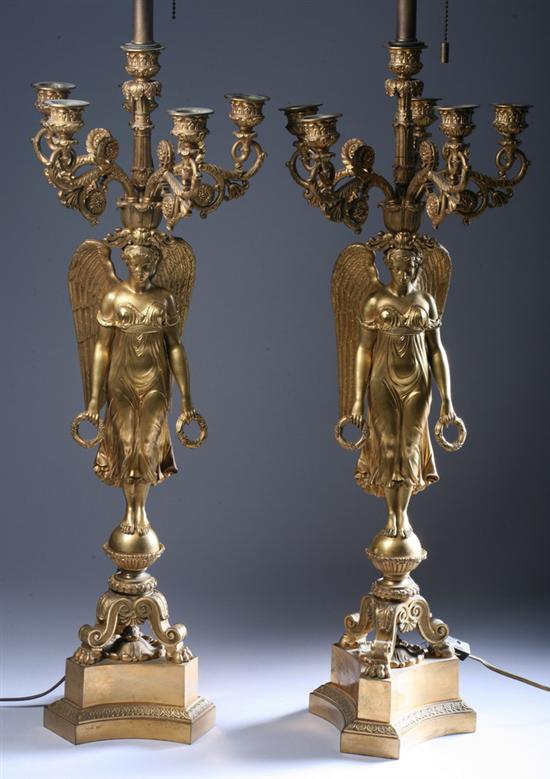 Appraisal: PAIR FRENCH EMPIRE BRONZE-DOR FIVE-LIGHT FIGURAL CANDELABRA th century Tripartite