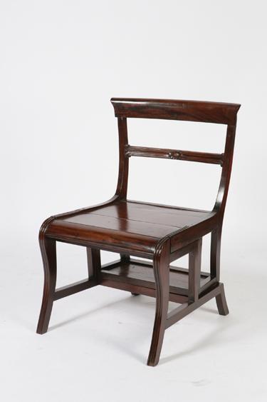 Appraisal: A REGENCY MAHOGANY METAMORPHIC LIBRARY CHAIR with a broad bar