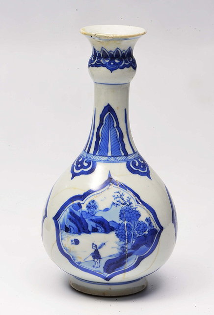 Appraisal: A CHINESE BLUE AND WHITE VASE with panels of landscapes