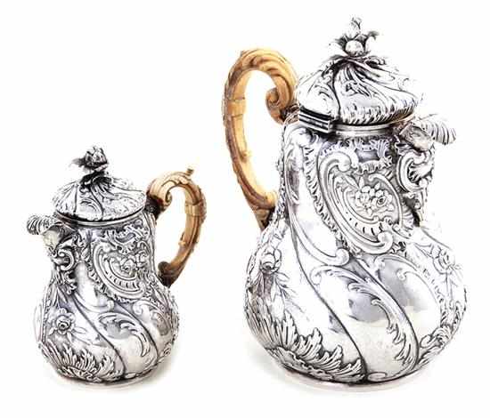 Appraisal: Continental silver coffeepot and creamer possibly Austro-Hungarian circa artichoke finial