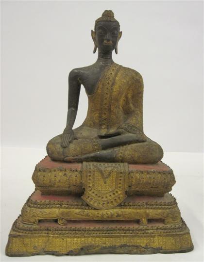 Appraisal: Thai gilt and black lacquered bronze Rattankosin Buddha th century