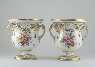 Appraisal: A large pair of English bone china wine coolers with