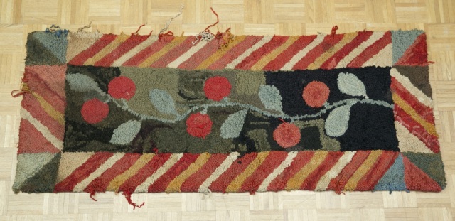 Appraisal: Late th c American Hooked Rug Cherry pattern with geometric