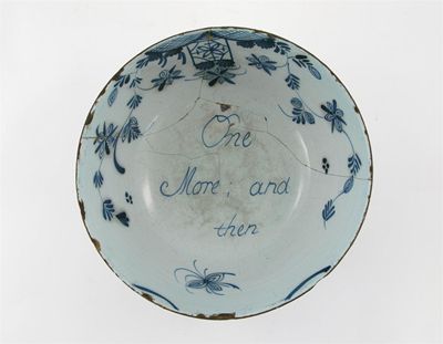 Appraisal: A Delftware blue and white punch bowl the interior bearing