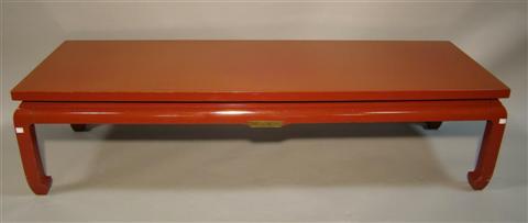 Appraisal: CONTEMPORARY CHINESE RED LACQUERED LOW TABLE the rectangular top raised