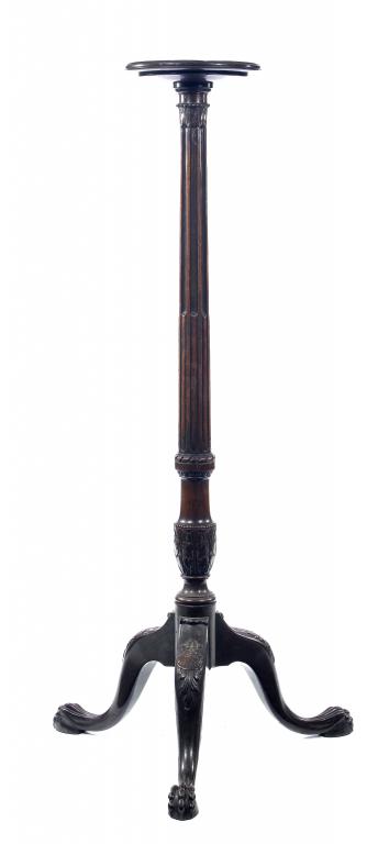 Appraisal: A VICTORIAN MAHOGANY TORCHERE the circular top on stop fluted