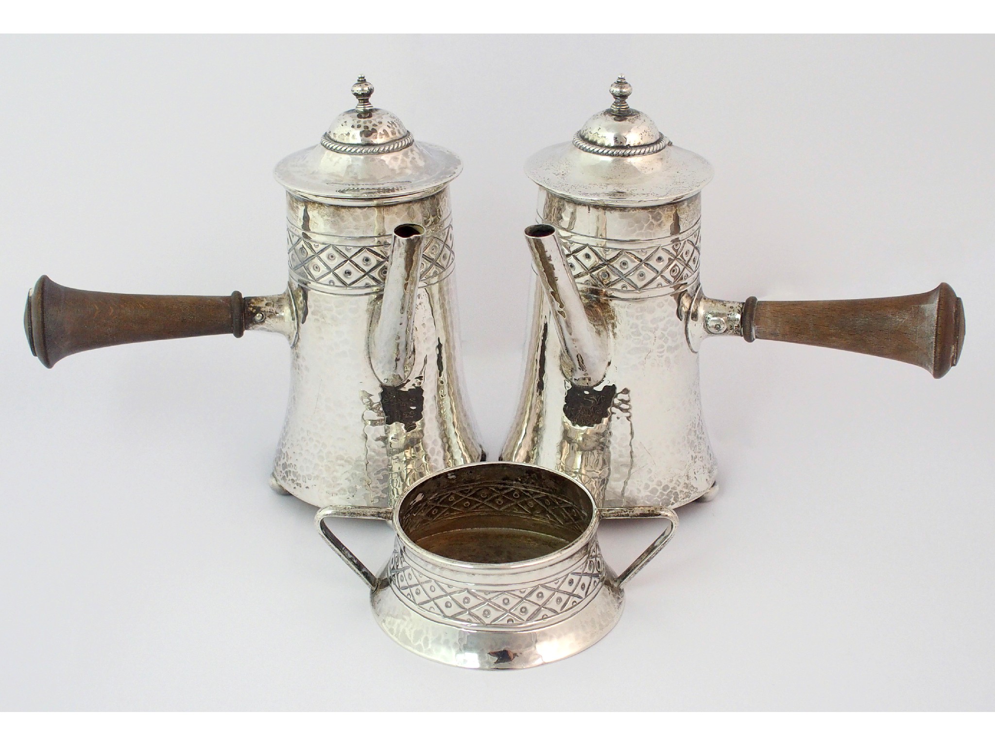 Appraisal: A hammered silver three piece Cafe au Lait setby Albert