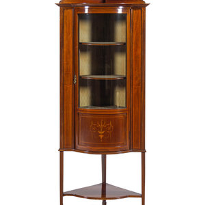 Appraisal: An Edwardian Mahogany and Marquetry Corner Vitrine Circa Height x