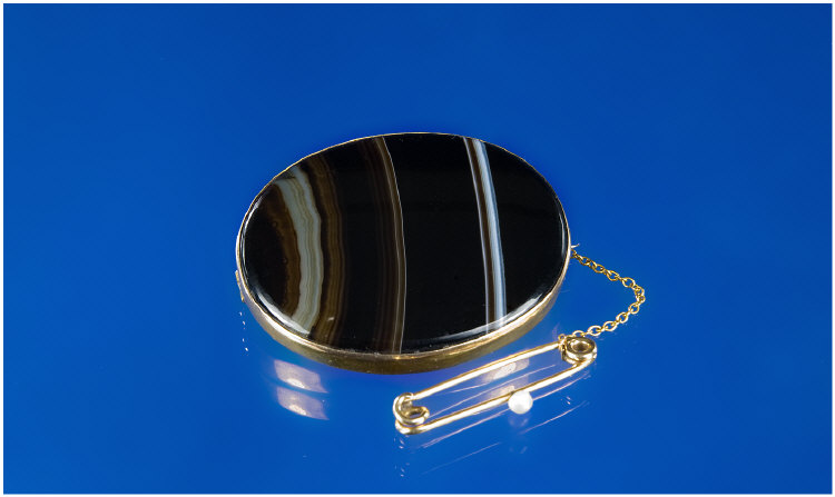 Appraisal: Large Oval Banded Agate Brooch Set In A ct Gold