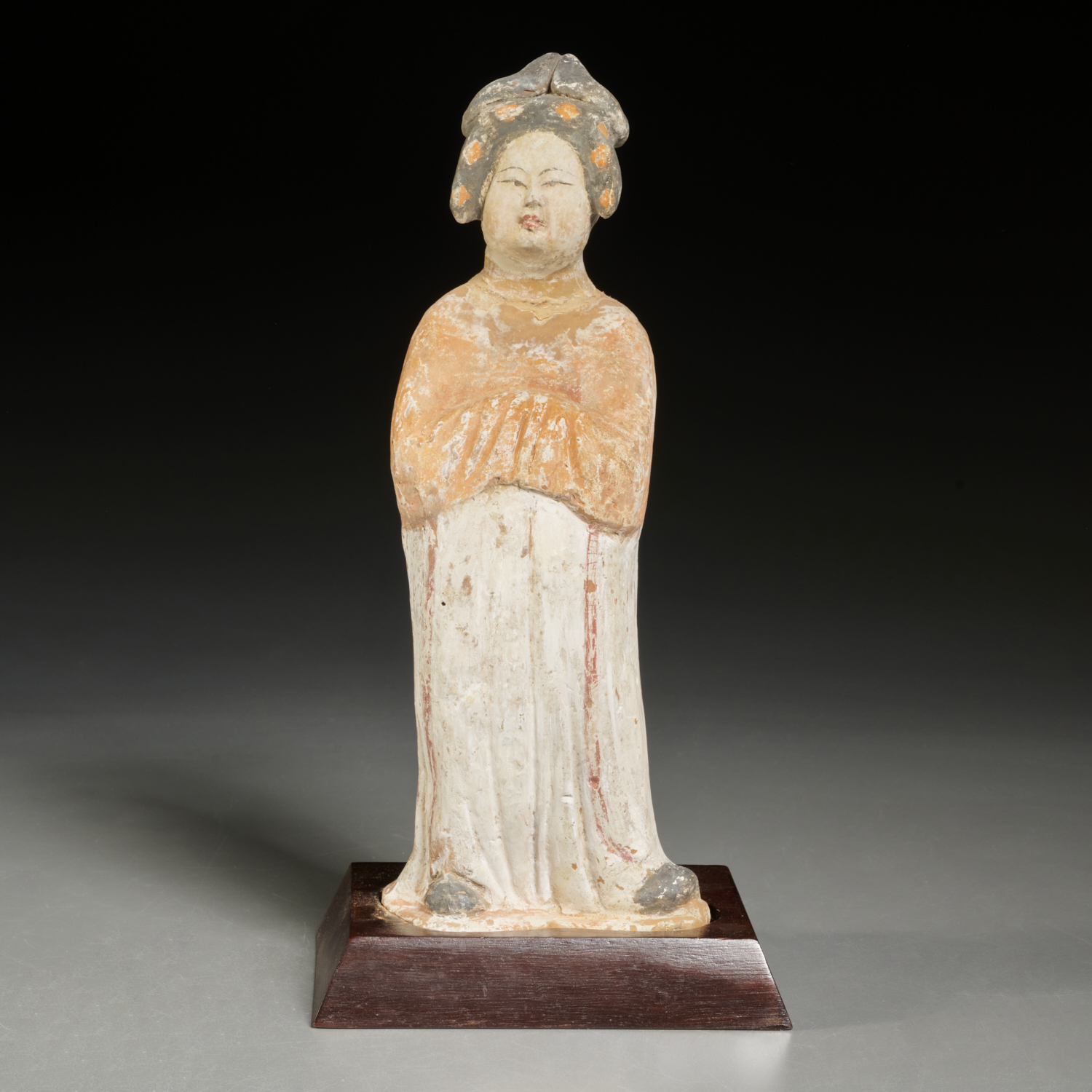 Appraisal: CHINESE PAINTED TERRACOTTA FIGURE OF A COURT LADY Possibly Tang