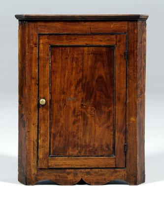 Appraisal: Georgian hanging corner cupboard mahogany with molded cornice single panel