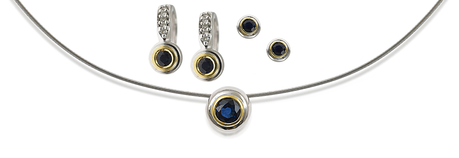 Appraisal: A SAPPHIRE JEWELLERY SUITE Comprising a pendant set with a