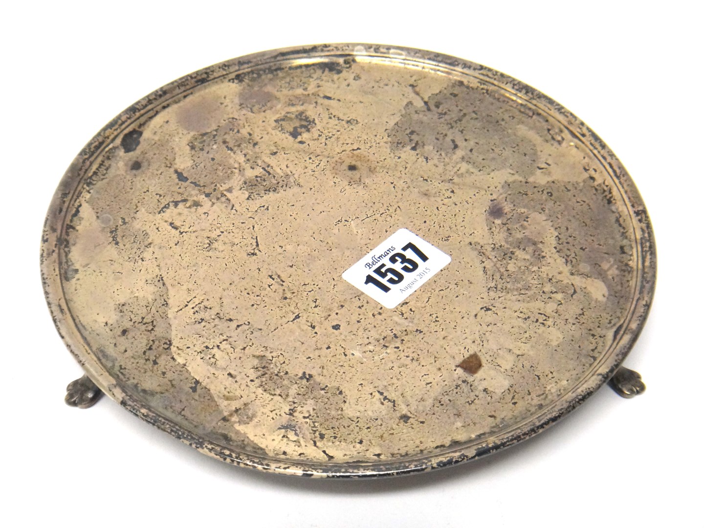 Appraisal: A silver circular salver with a slightly shaped rim raised