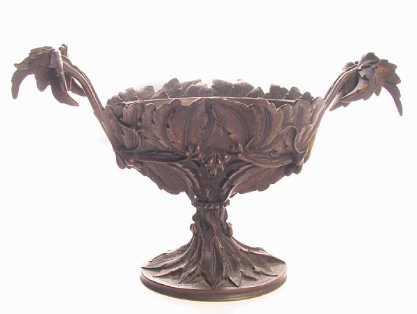 Appraisal: A patinated bronze bowl Cast with leaves and berries height