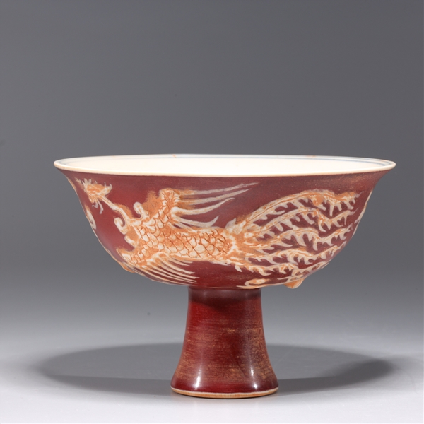 Appraisal: Chinese sang de boeuf stem bowl with phoenixes in high