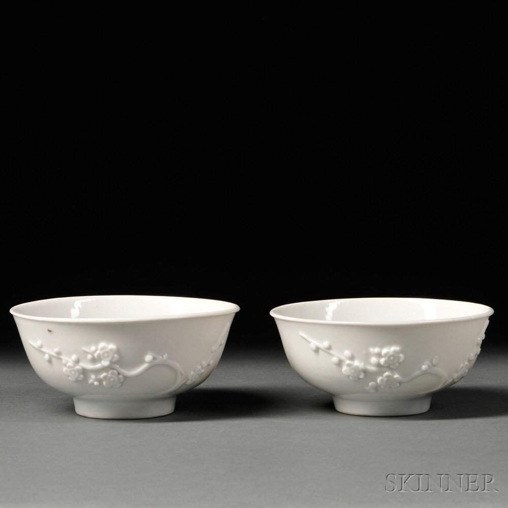 Appraisal: Two Blanc-de-Chine Bowls China Qing Dynasty decorated with applied plum