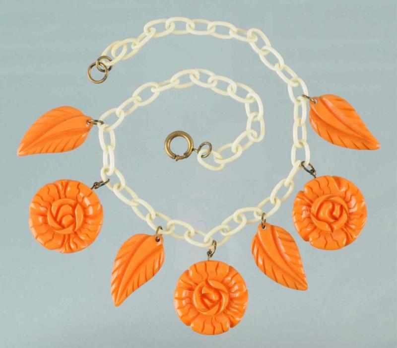 Appraisal: Bakelite Carved Orange Floral Leaf Necklace Condition Excellent Size -