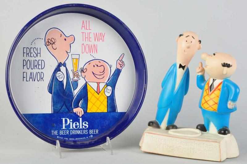 Appraisal: Lot of Piels Advertising Figures Tin serving tray with vinyl