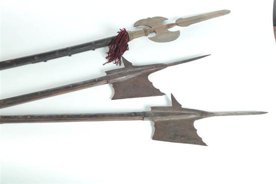 Appraisal: THREE POLE ARMS European probably th century Halberds with steel