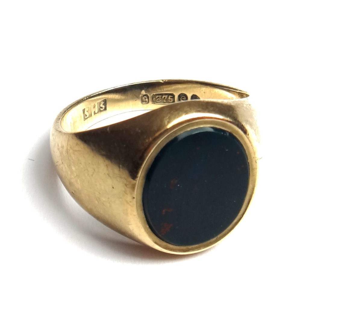 Appraisal: A ct gold and bloodstone set oval signet ring London