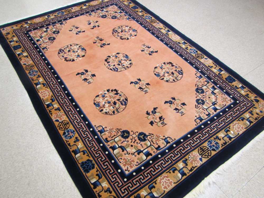 Appraisal: CHINESE CARPET hand knotted in traditional Peking design featuring floral