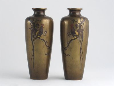 Appraisal: A pair of Japanese bronze vases inlaid in gold and