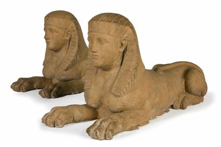 Appraisal: A pair of large th century terracotta sphinx each in