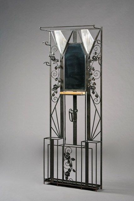 Appraisal: A French Art Deco wrought iron marble and frosted glass