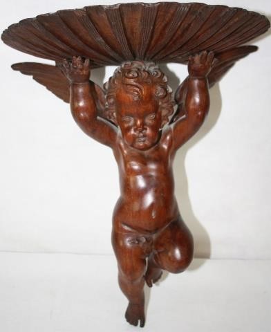 Appraisal: TH CENTURY CARVED WOODEN BRACKET IN THE FORMOF A CHERUB