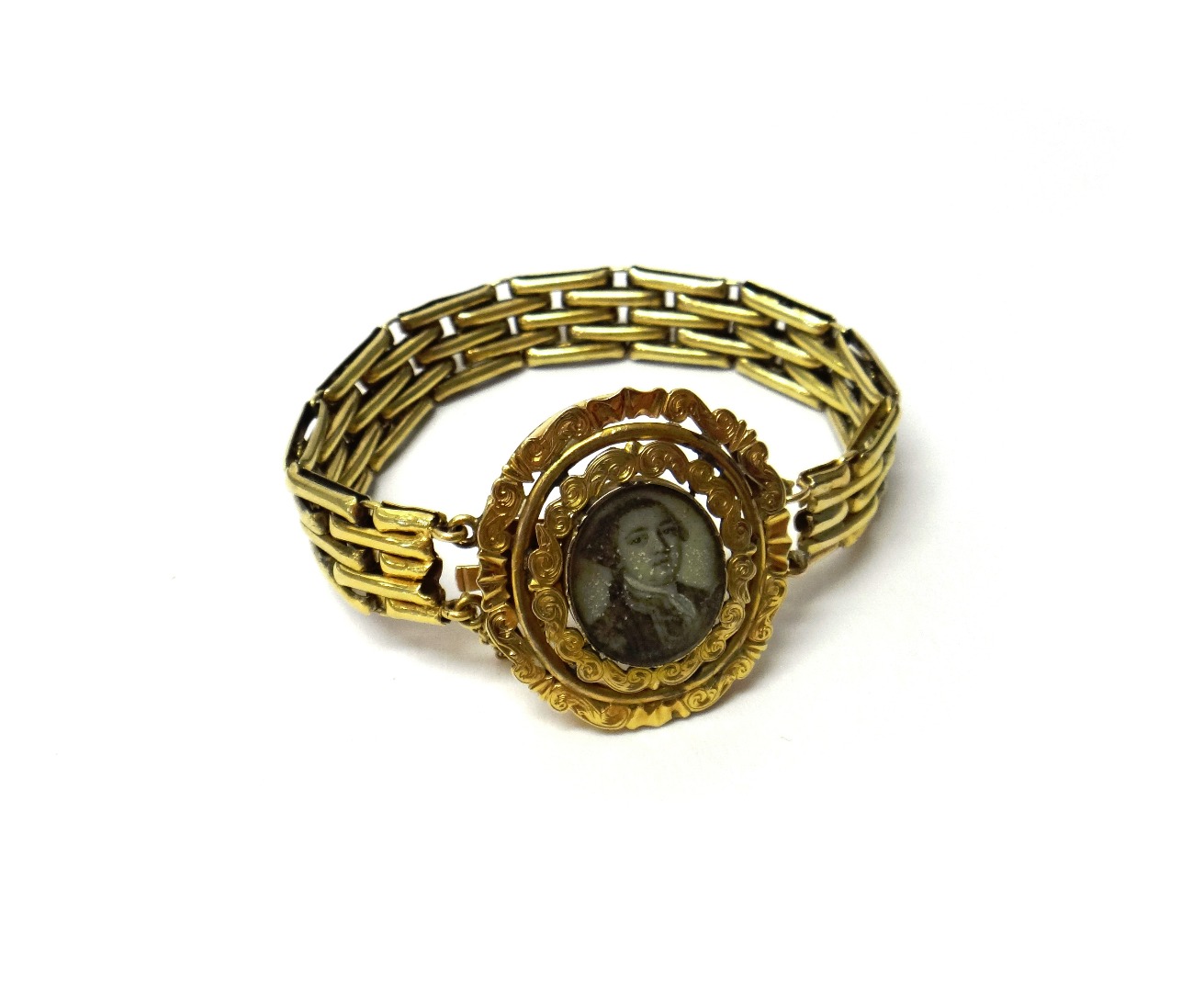 Appraisal: A portrait miniature bracelet the oval front panel glazed with