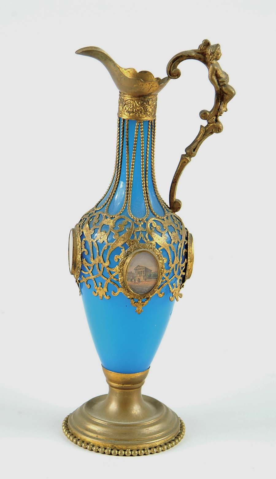 Appraisal: INTERESTING EUROPEAN GLASS AND BRASS EWER Blue opaline type glass