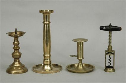 Appraisal: Three Brass Candlesticks together with a Corkscrew