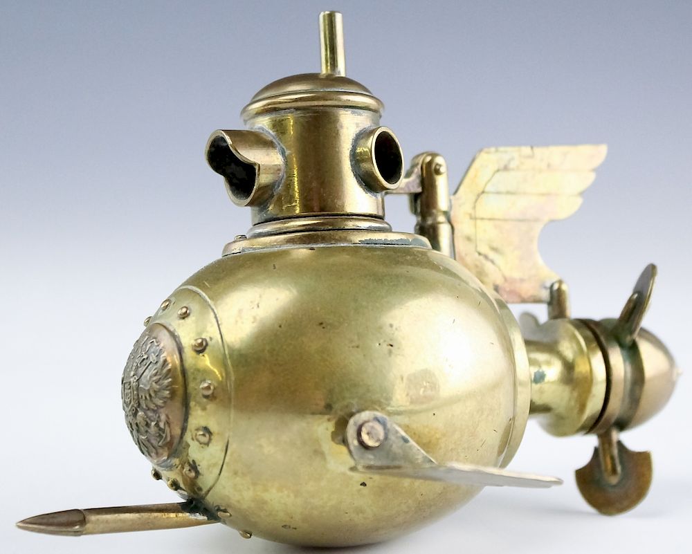 Appraisal: Articulated Bronze Torpedo Submarine Table Lighter Antique articulated bronze table