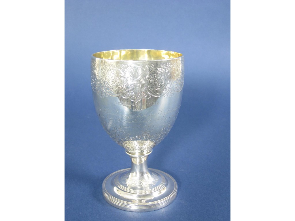 Appraisal: A George III Goblet with leafage scroll engraved frieze presentation