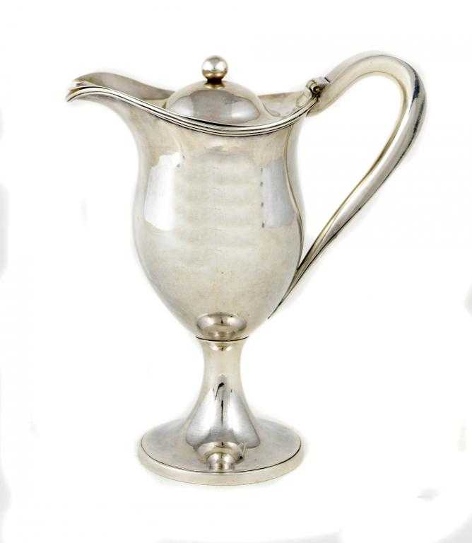 Appraisal: A GEORGE III COFFEE JUG of slender baluster shape with