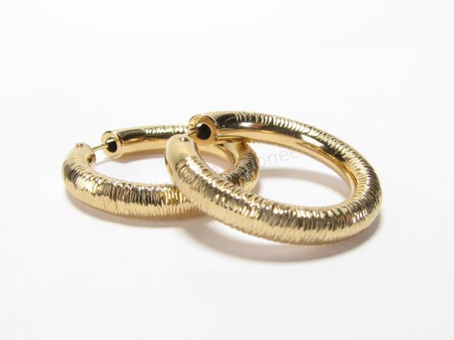 Appraisal: A pair of K yellow brushed gold hoop earrings approximately