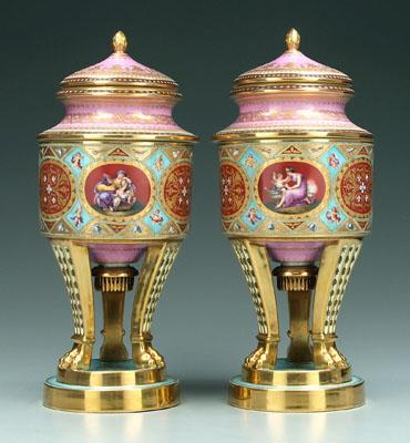 Appraisal: Pair Royal Vienna lidded urns each with three oval panels