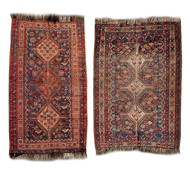 Appraisal: TWO ANTIQUE MIDDLE EASTERN RED AND BLUE GROUND RUGS each