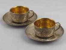 Appraisal: A pair of Russian silver cups and saucers pre revolution