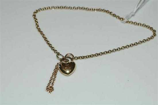 Appraisal: A FANCY LINK BRACELET WITH A HEART LOCKET STAMPED CT