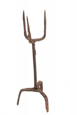 Appraisal: A wrought iron pricket candlestick probably Spanish th Century cm