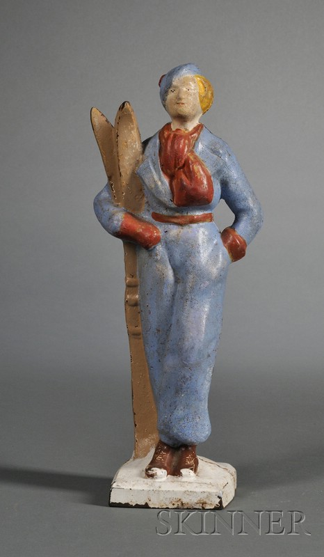 Appraisal: Painted Cast Iron Skier Doorstop America c two-piece full-length figure