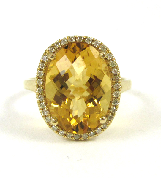 Appraisal: CITRINE DIAMOND AND FOURTEEN KARAT GOLD RING with round-cut diamonds