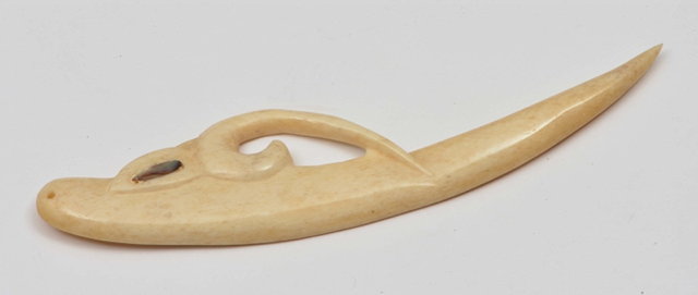 Appraisal: A MAORI IVORY PENDANT in the form of a fish