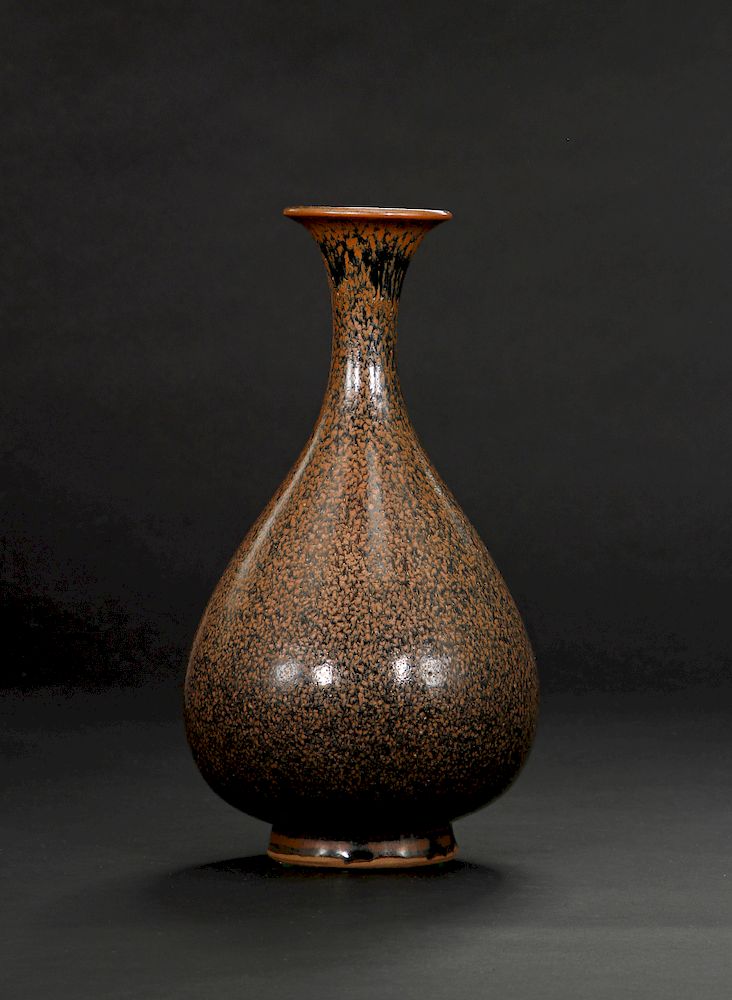 Appraisal: Cizhou Black Glazed Russet Spotted Yuhuchuan Vase Set on a