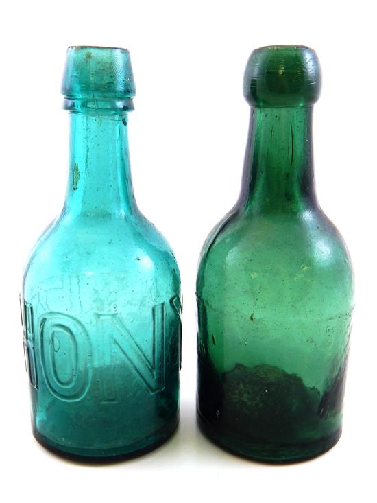 Appraisal: GLASS Two bottles ANTHONY soda bottle American emerald green applied